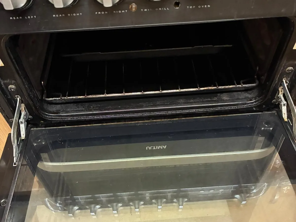 An oven cleaned back to a spotless finish